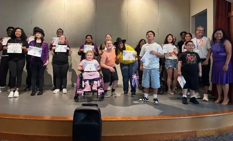 Jasmine's Beat dancers and team gathered onstage after Bash with certificates