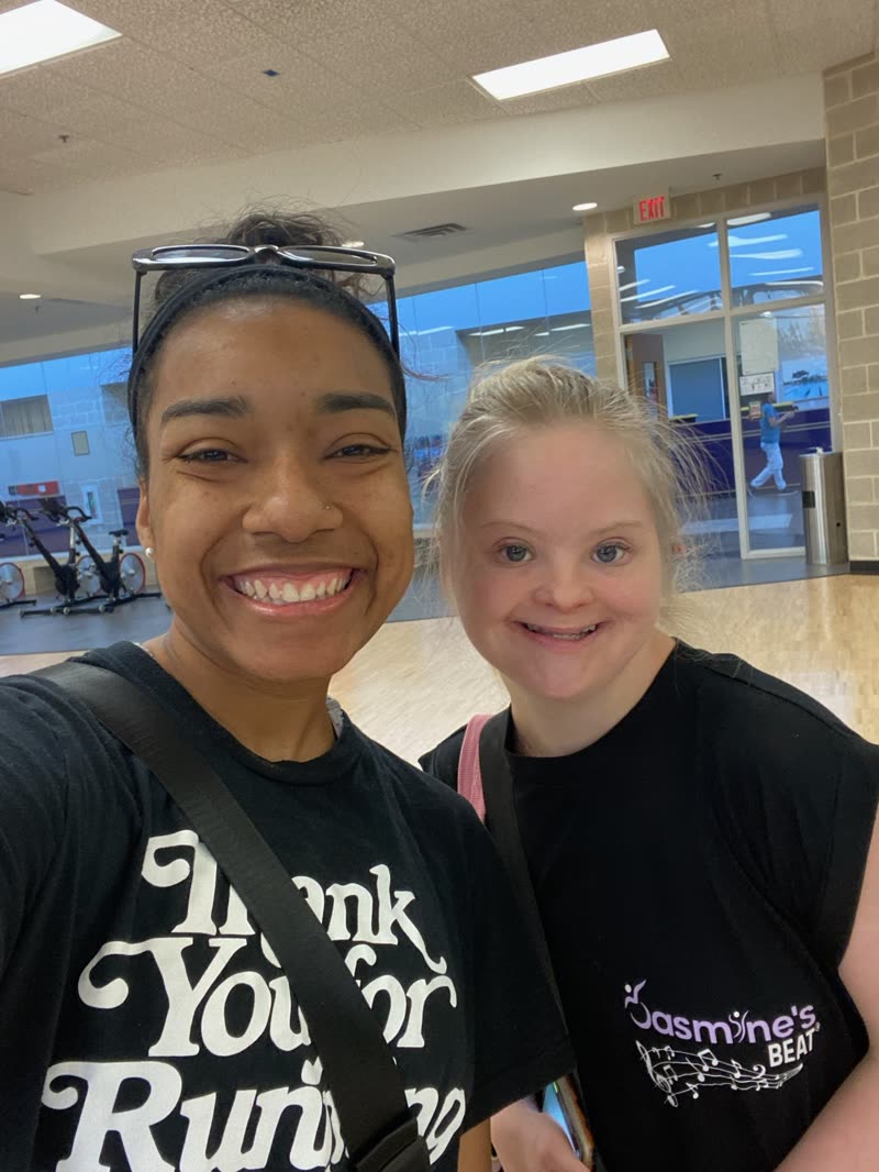 Smiling Jasmine's Beat dancer and instructor posing together